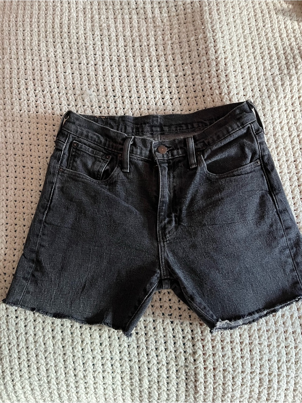 Levi’s High-Rise Black Denim Cutoff Shorts with Raw Hem